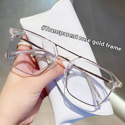 Anti-blue light glasses with a sand black and silver double beam frame, held against a white case. - Image 8