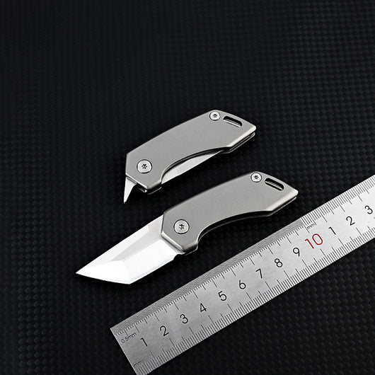Cuchillo Táctico de Aleación de Titanio Portátil Multiusos con Abreador - Image 6