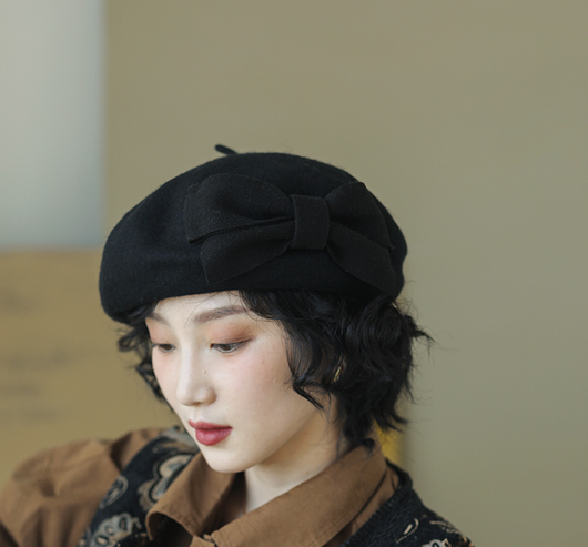 Boina de Lana con Moño Retro para Mujer - Elegante y Cálida para Otoño e Invierno