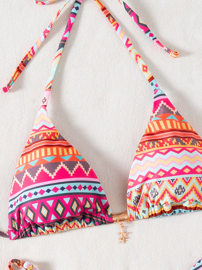 Vibrant geometric print triangle-bra bikini swimsuit with adjustable ties and high-cut ruched bottom. - Image 15
