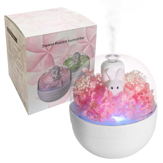 White rabbit preserved flower aromatherapy humidifier with pink flowers and blue light under a clear dome. - Image 5