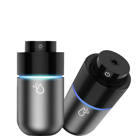 Silver-gray car humidifier and air purifier with a black top, emitting mist and glowing with a blue LED light. - Image 7