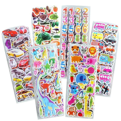A hand holds a large stack of colorful 3D bubble stickers, with sheets featuring cars, vegetables, numbers, and animals. - Image 4