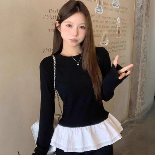 Blusa Entallada de Cuello Redondo con Diseño Minimalista