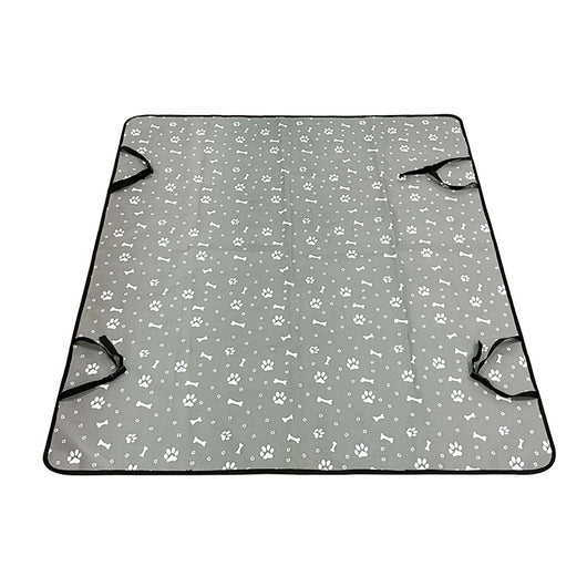 Pink car pet mat with white paw print and bone patterns, featuring black straps for securing to a rear seat. - Image 7