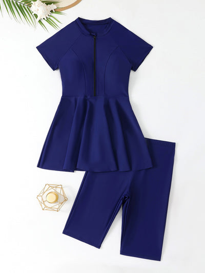 Navy blue two-piece conservative swimwear with short-sleeve peplum top and mid-length shorts, featuring a front zipper. - Image 7