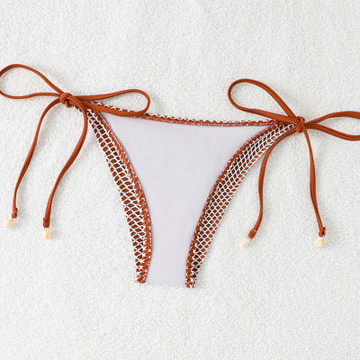 Blue and white mesh triangle bikini set with tie-side bottom and shell accents, displayed on a white beach towel. - Image 31