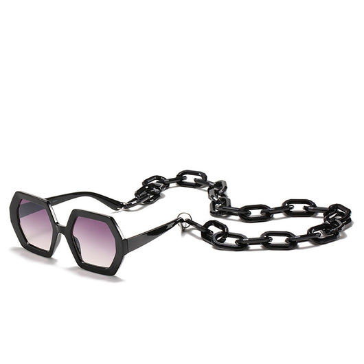 Octagonal sunglasses with brown gradient lenses and a tortoiseshell chain strap on a white background. - Image 4