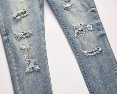 Jeans Azules Rotos con Desgaste Vintage - Image 6