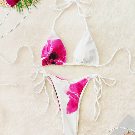White and pink floral print three-piece bikini swimsuit with a halter top, tie-side bottom, and long maxi skirt. - Image 4