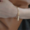 Pulsera Cadena con Hebilla Chapada en Oro y Circonitas Incrustadas