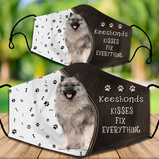 Two cotton face masks with a Bichon Frise dog, paw prints, and bones on a white and brown background. Text reads "Bichon Frise KISSES FIX EVERYTHING." - Image 43