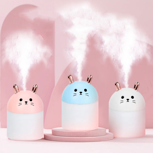 Cute sky blue and white mini USB rabbit humidifier with gold ears, ideal for home or office aromatherapy.
