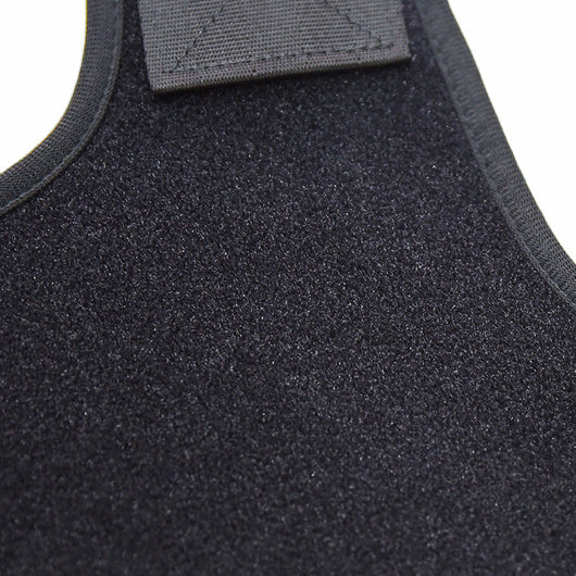 Black back shoulder spine posture corrector worn over a white long-sleeved shirt, showing adjustable straps. (2 pcs) - Image 6