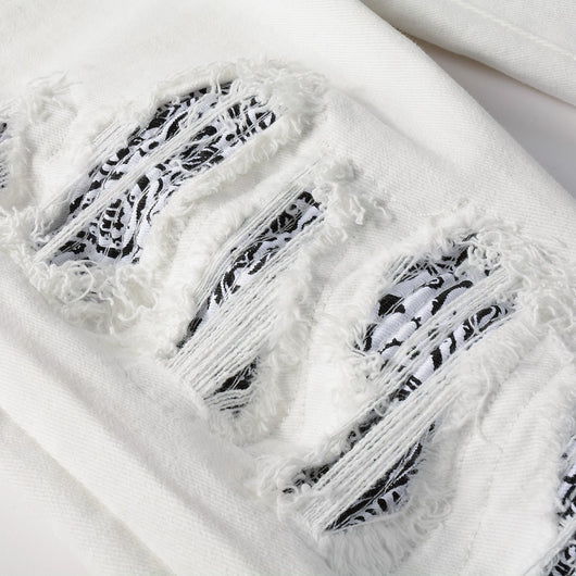 Jeans Rotos Blancos con Detalle de Flor de Marañón - Image 16