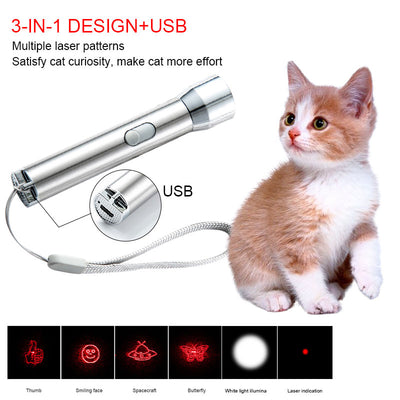 Silver stainless steel laser pointer pet toy with a grey wrist strap, resting on a white computer keyboard. - Image 4