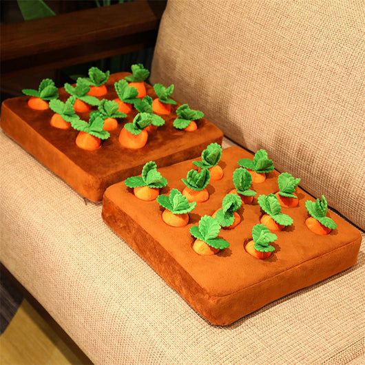 Brown plush snuffle mat with ten orange carrot-shaped toys, each with green leafy tops, for pet foraging and play. - Image 18