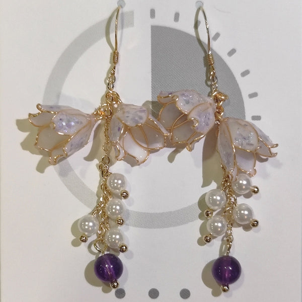 Aretes de Plata Esterlina con Flor Linglan y Resina - Diseño Elegante