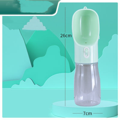 Pink portable pet water bottle with integrated feeder bowl, clear reservoir, and dispensing button for dogs. - Image 16