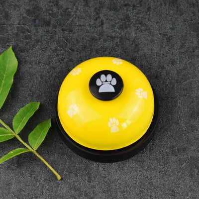 Blue and yellow pet training bell with white paw print designs and a large yellow button on top. - Image 11