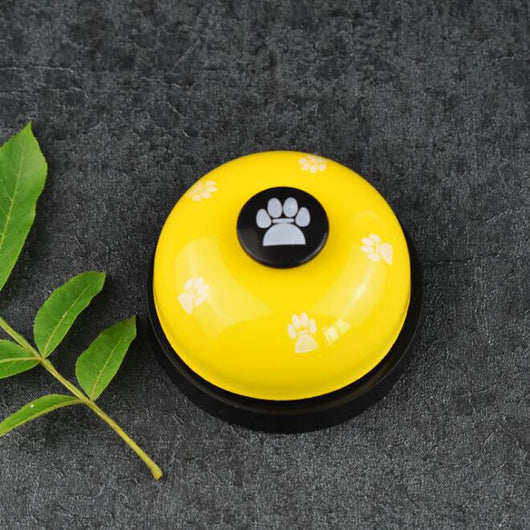 Blue and yellow pet training bell with white paw print designs and a large yellow button on top. - Image 11