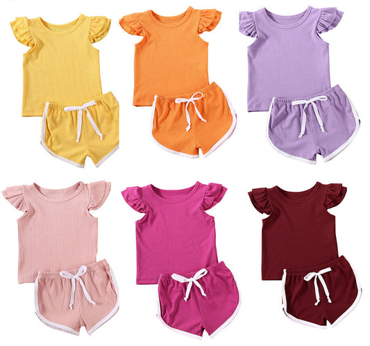 Conjunto Deportivo Dos Piezas: Playera y Shorts con Mangas Voladoras