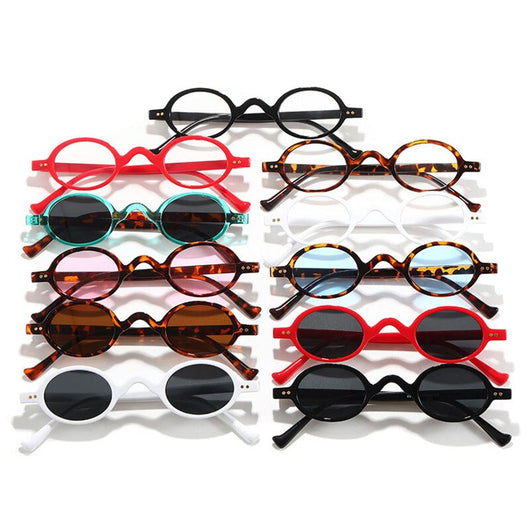 Red small frame round glasses with clear lenses, featuring a retro or steampunk style.