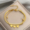 Pulsera de Amor en Oro 18K con Cuerda Multicapa - Diseño Exclusivo