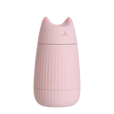 Pink cat-shaped humidifier with pointed ears and a ribbed texture on the lower body, ideal for desktop use. - Image 13