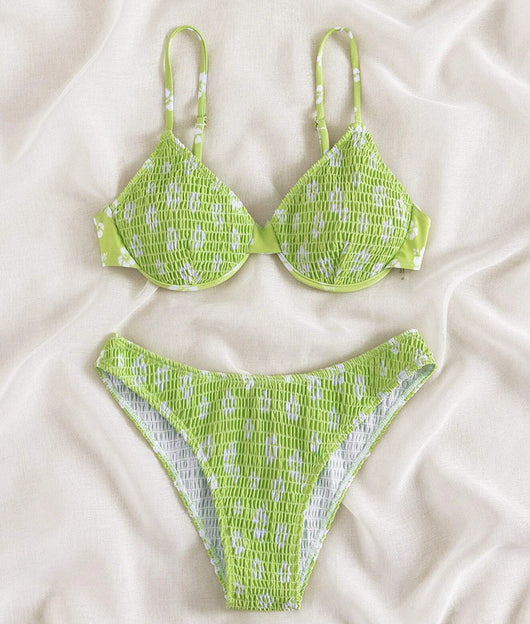 Periwinkle blue two-piece swimsuit with white floral pattern and ruched texture, featuring an underwire bikini top and high-cut bottoms. - Image 20
