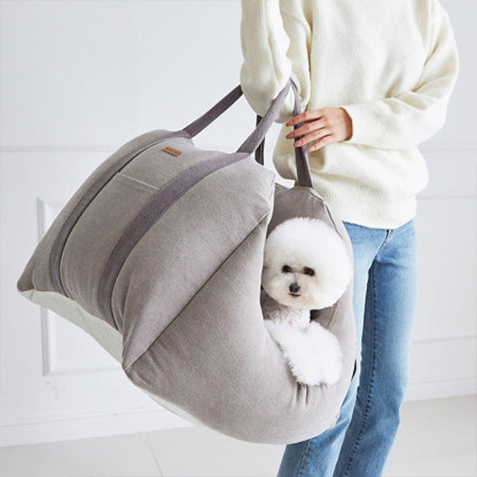 Beige pet car carrier seat with tan straps and a separate red pet seatbelt leash for safe car travel. - Image 4