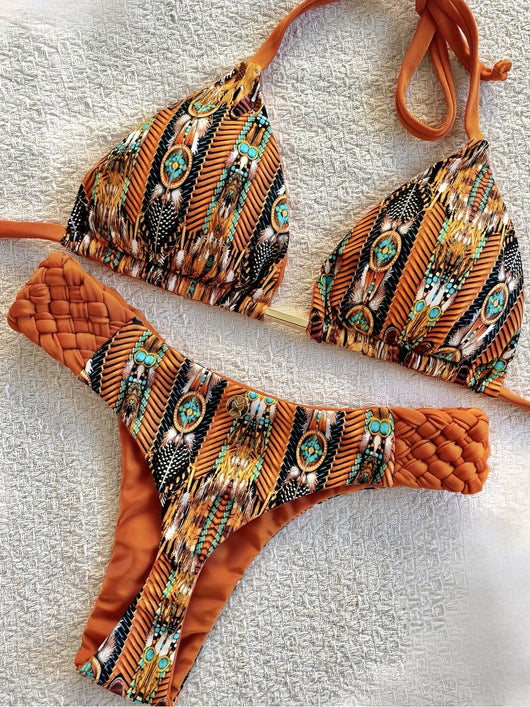 Women's blue, white, and gold marble print bikini with a triangle halter top and braided rope side details. - Image 17
