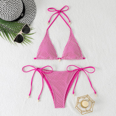 Blue and white mesh triangle bikini set with tie-side bottom and shell accents, displayed on a white beach towel. - Image 6