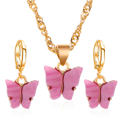 Pink acrylic butterfly necklace and earring set with gold-colored chain and hoop earrings. - Image 6