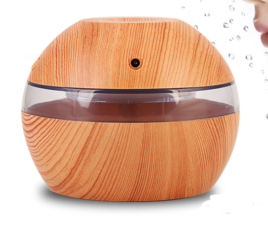 Mini essential oil diffuser humidifier with wood grain finish, USB cable, and instruction manual on a white background. - Image 5
