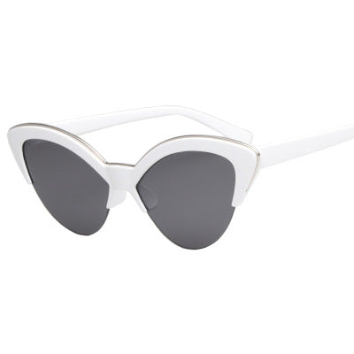 Purple cat-eye sunglasses with translucent frames and purple lenses, featuring a silver-tone accent. - Image 11