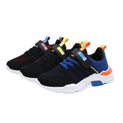 Boy's black and blue sports shoes with orange accents, mesh upper, white sole, blue laces, and a Velcro strap. - Image 5