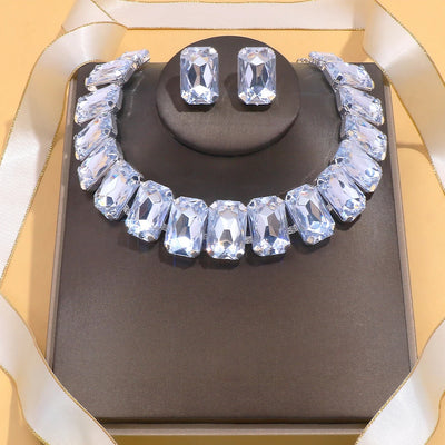 Light luxury geometric crystal necklace and square exaggerated earrings jewelry set in gold tone.