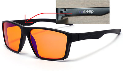 Black frame blue light blocking glasses with orange lenses and 're sleep' logo on the temple. - Image 6
