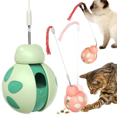Green and light green plastic cat food leakage toy with a spherical body, cutouts, and a braided rope. - Image 6