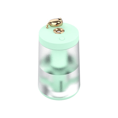 Cute cat-themed USB desktop humidifier with a pink top and base, frosted clear body, and gold cat ear accent. - Image 9