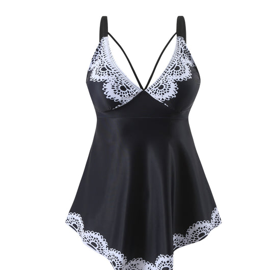 Black plus size tankini top with a colorful scalloped pattern on the bust and hem, featuring criss-cross straps. - Image 9