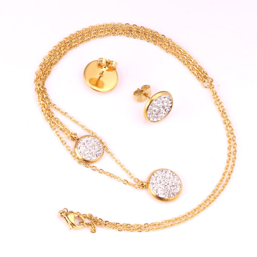 Gold plated stainless steel jewelry set with two layered necklaces and matching stud earrings. Features round crystal-studded pendants. - Image 4
