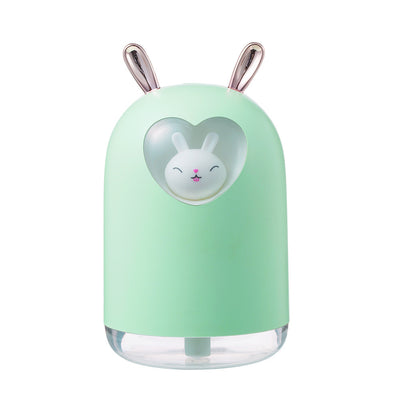 White rabbit humidifier with rose gold ears, a heart-shaped cutout, and a smiling bunny figure inside. - Image 8