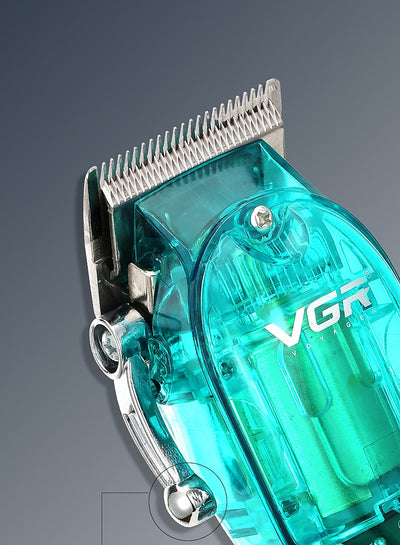 Transparent teal rechargeable hair clipper with digital display, four guide combs, cleaning brush, oil, and charging cable. - Image 9