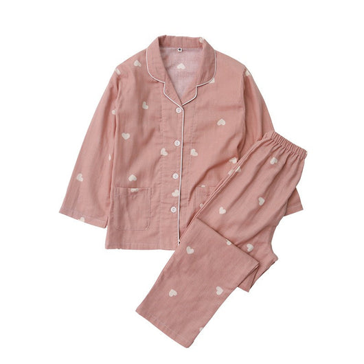 Pink long-sleeved pajama set for children with an all-over cherry print, Peter Pan collar, and matching pants. - Image 6