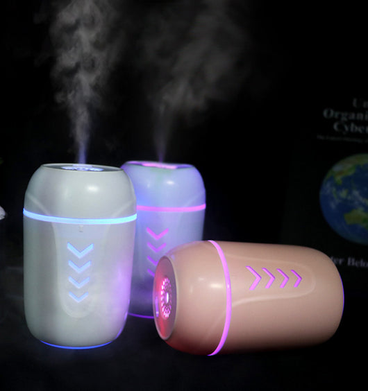 Light blue portable car humidifier with chevron pattern, white USB LED light, and white USB mini fan.