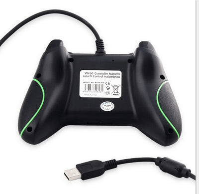 Black wired USB game controller with green accents, two joysticks, and ABXY buttons, shown with USB, USB-C, and micro-USB adapters. - Image 4