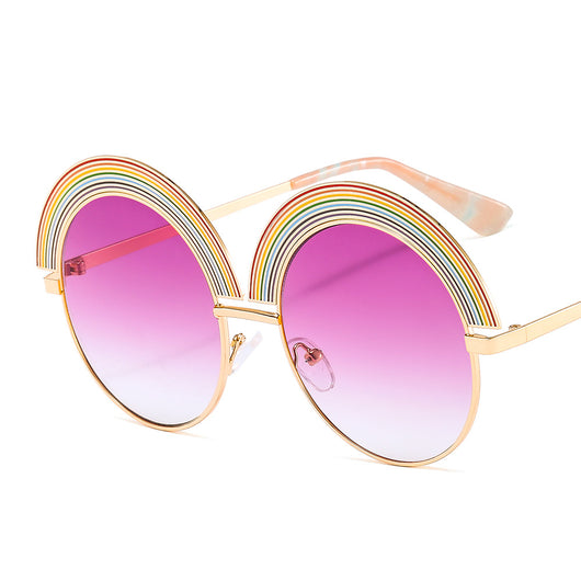 Metal rainbow large round frame sunglasses with pink gradient lenses and a gold-tone frame. - Image 11