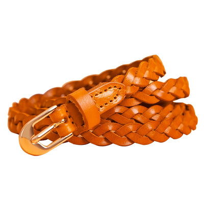 Women's braided brown leather belt with a D-shaped gold-tone pin buckle, coiled on a peach background. - Image 7